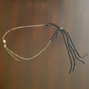 Silver chain with black stone